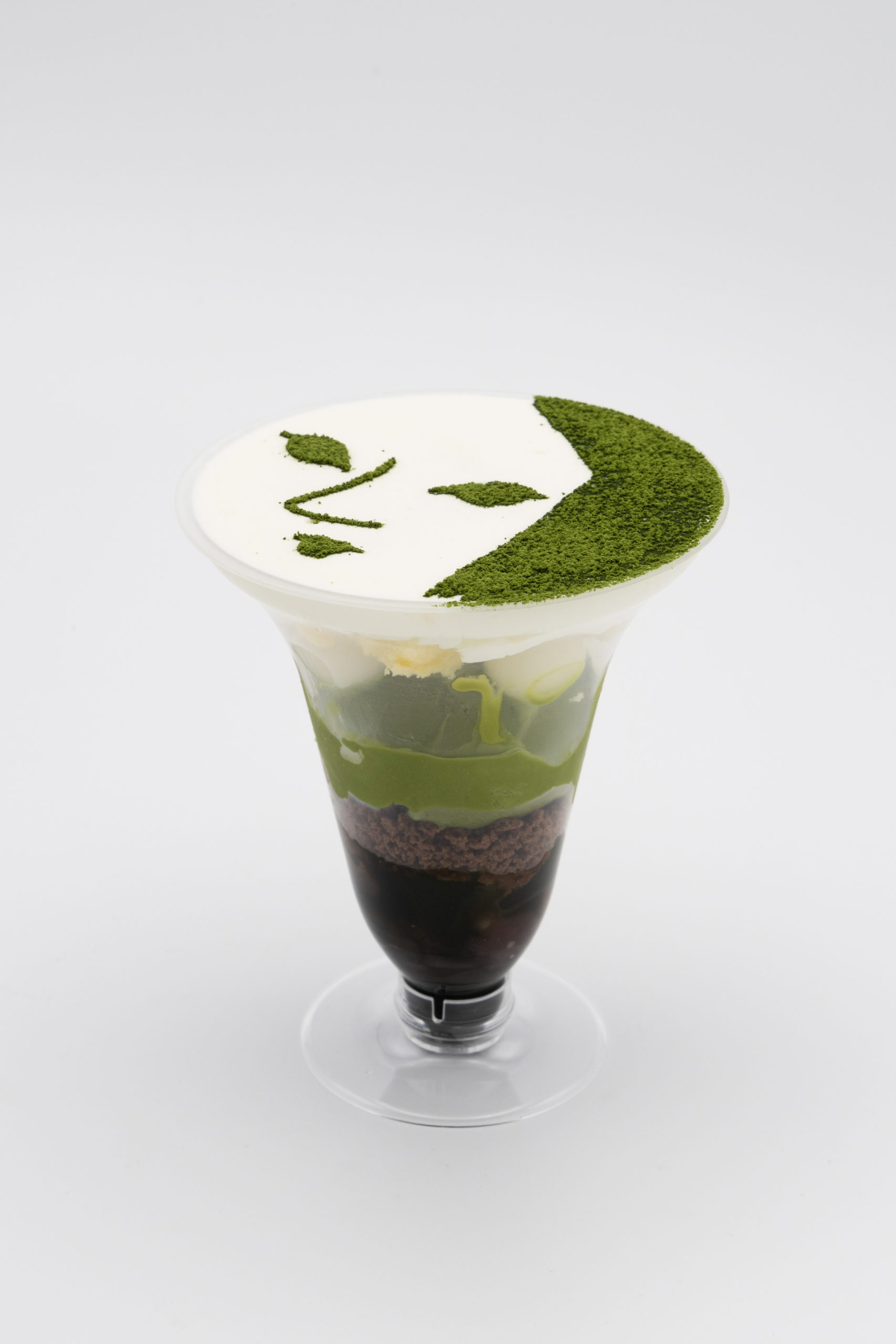 抹茶顔が描かれたパフェ